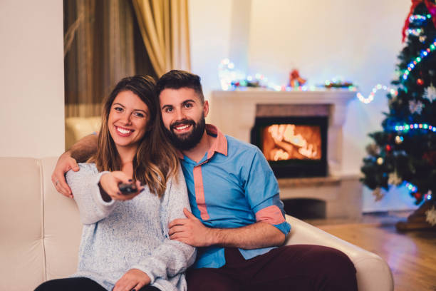 istock Couple spending Christmas together at home 1192128508