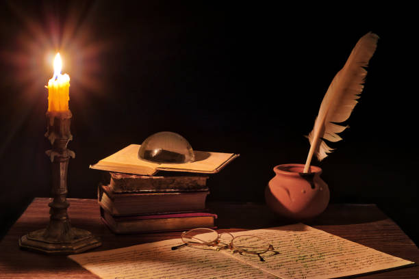 istock Ancient writer's working desk with candlestick 1192131434