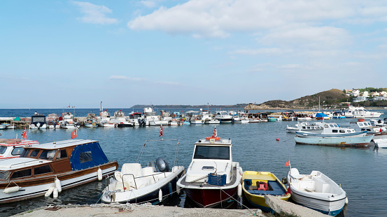 Gallipoli (Gelibolu) Guneyli village in Canakkale, Turkey. Small fishing boats waiting at the port.