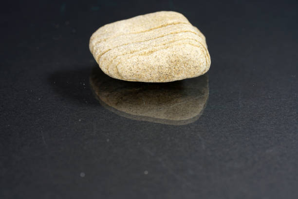 a sharp shot  of a stone with a blurred simple background