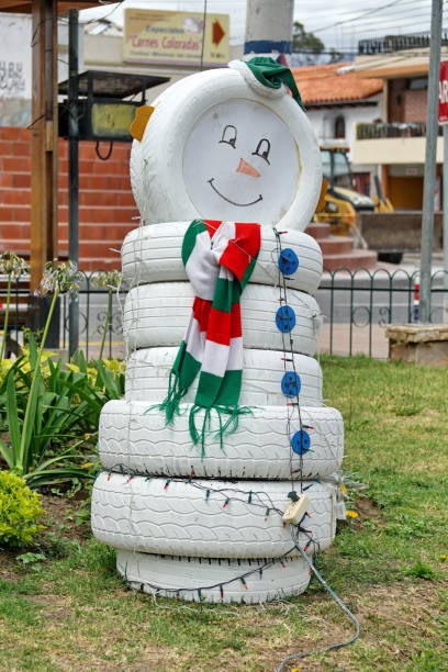 Snowman Christmas decoration made from tires in Matriz Park in Cotacachi, Ecuador