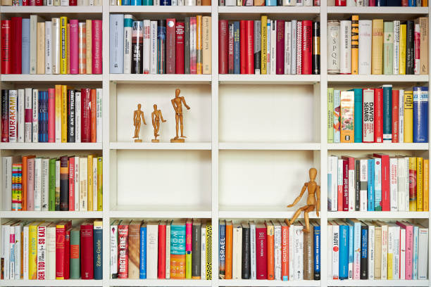 istock Wooden painters dolls in library 1192135059