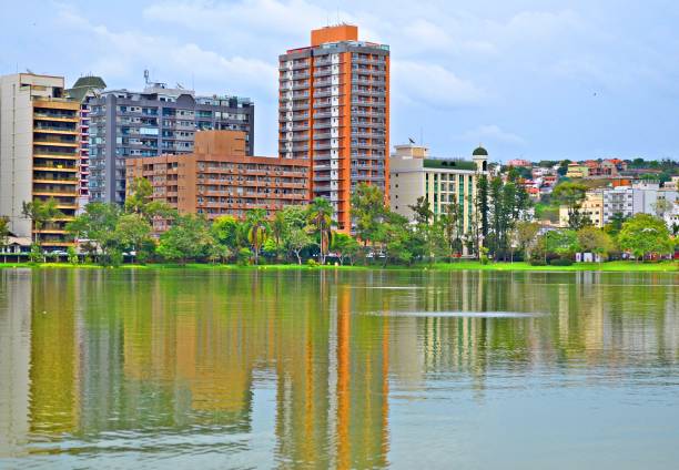 istock Mirrored buildings on lake 1192141426