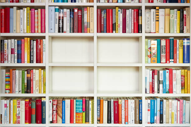istock Library, white shelves, multi colored books, 4 parts empty 1192143213
