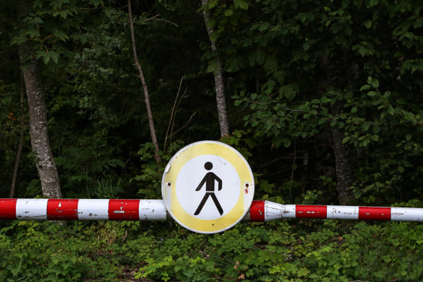 istock Passage is prohibited - Road sign on the barrier 1192145071