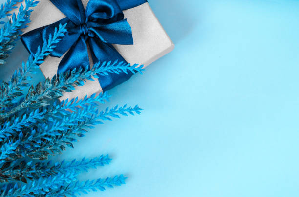 istock Gift box and lavender on blue background copy space 1192146569