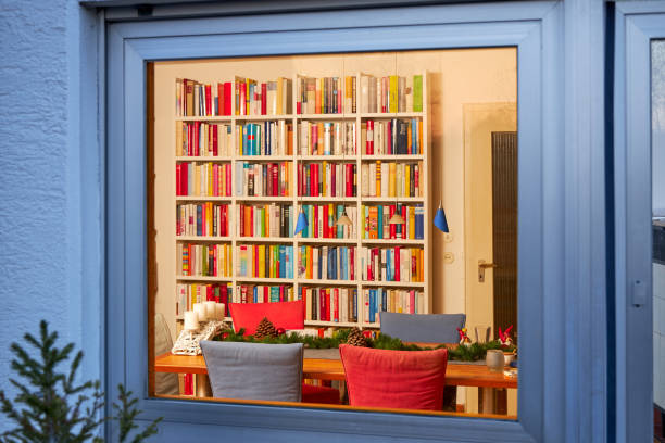 istock Christmas in the library, view from outside into the window 1192147486