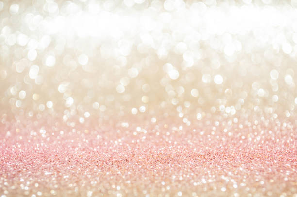 istock Pink gold, pink bokeh,circle abstract light background,Pink rose shining lights, sparkling glittering Valentines day,women day or event lights romantic backdrop.Blurred abstract holiday background. 1192148057