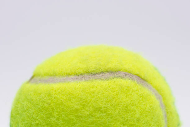 istock Isolated yellow tennis ball on white 1192150974