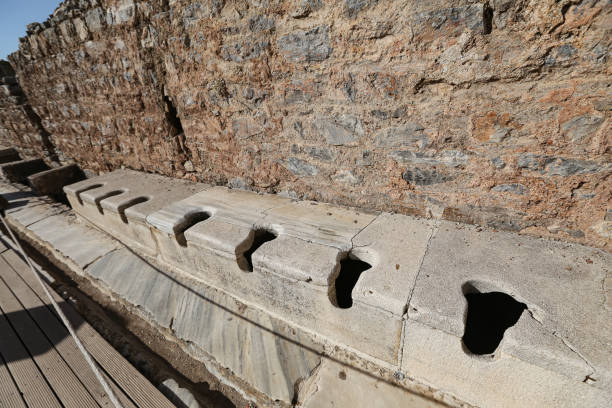 public toilets of ephesus ancient city, izmir, turkey - toilet public restroom ephesus history imagens e fotografias de stock