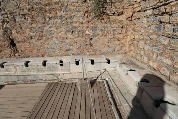 public toilets of ephesus ancient city, izmir, turkey - toilet public restroom ephesus history imagens e fotografias de stock