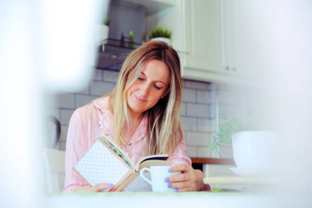 istock Beautiful young woman at home 1192151478