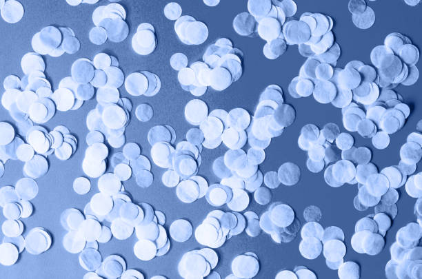 istock Beautiful background with round confetti in classic blue. 1192152392