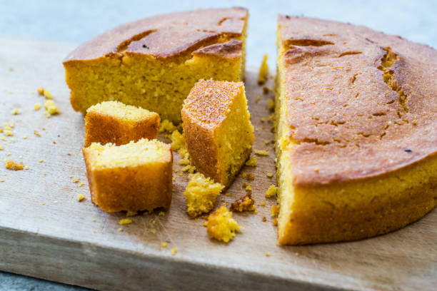 istock Fresh Baked Corn Bread Slices on Wooden Board. 1192152707