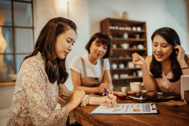 istock Chinese millennial women preparing crowdfunded project 1192154084