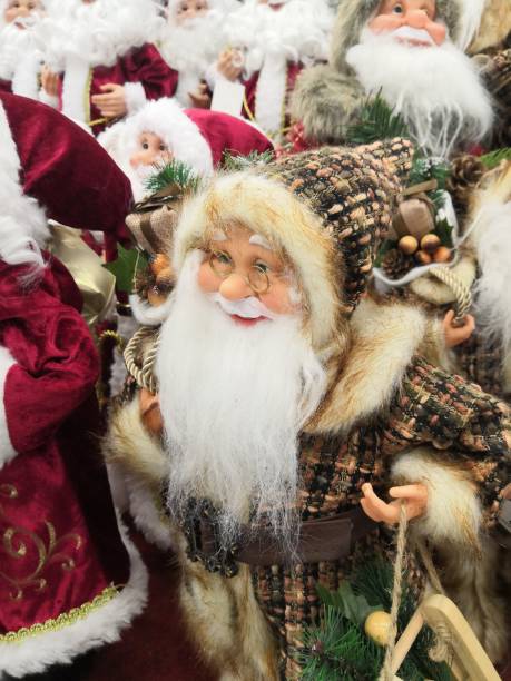 istock Christmas gnome with a beard in glasses and a hat 1192154100