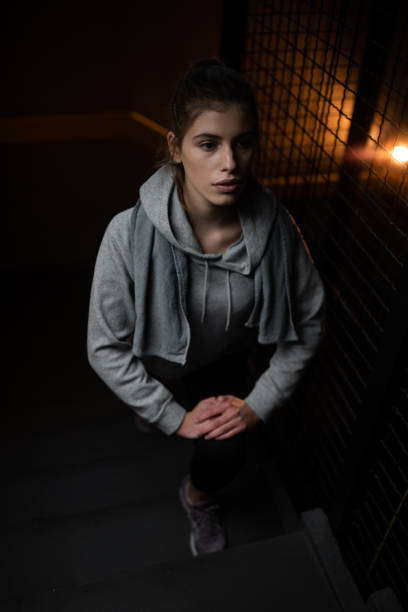 istock Female athlete exercising on staircase 1192156579