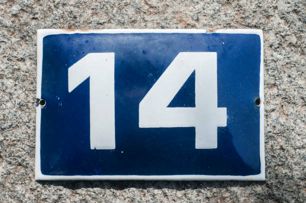 istock Weathered enameled plate number 14 1192161271