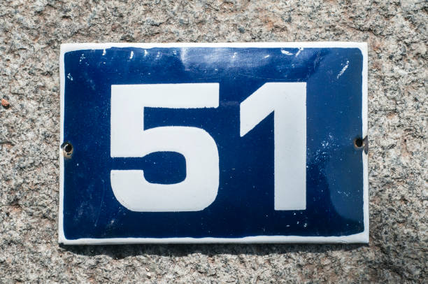 istock Weathered enameled plate number 51 1192161275