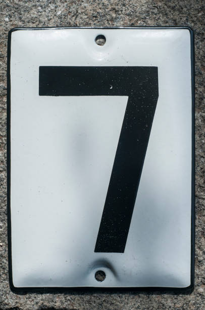 istock Weathered enameled plate number 7 1192161310
