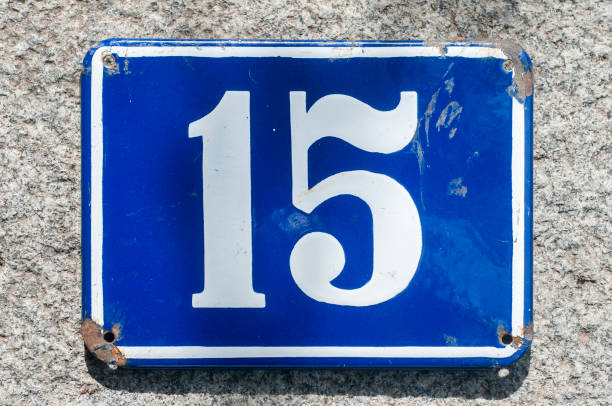 istock Weathered enameled plate number 15 1192161359