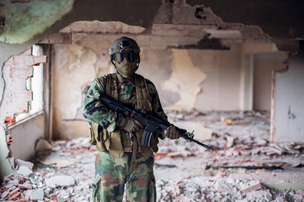 istock Army soldier in war zone 1192161420