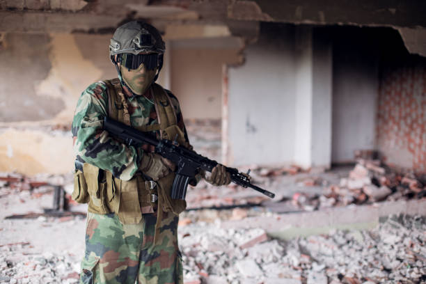 istock Army soldier in war zone 1192161448