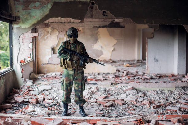 istock Army soldier in war zone 1192161531