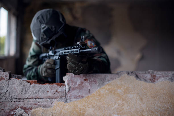 istock Army soldier in war zone 1192161618