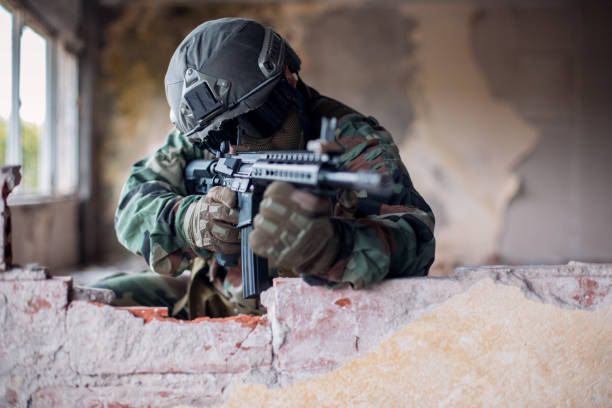 istock Army soldier in war zone 1192161835