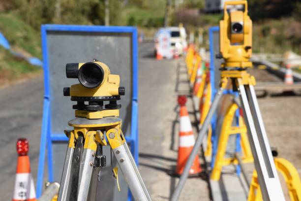 istock Installation construction of street gutter on the road. 1192165743