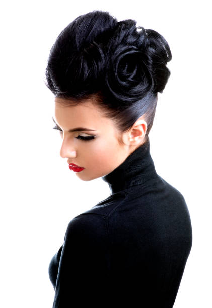 istock Beautiful young woman with professional make-up. 1192168230