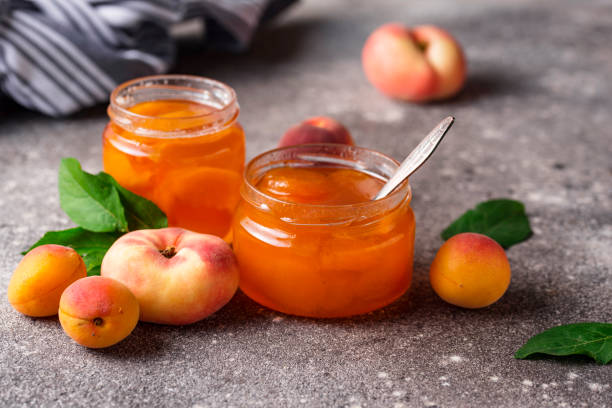 istock Apricot jam in glass jar 1192169527