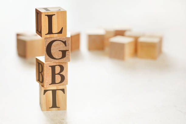 istock Four wooden cubes arranged in stack with text LGBT on them, space for text image at down right corner 1192175562