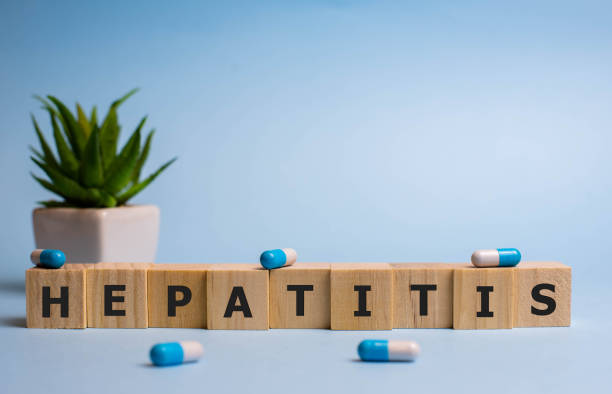 istock Hepatitis word from wooden blocks on blue background. 1192177700