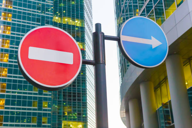 istock traffic signs in front of skyscrapers 1192178085