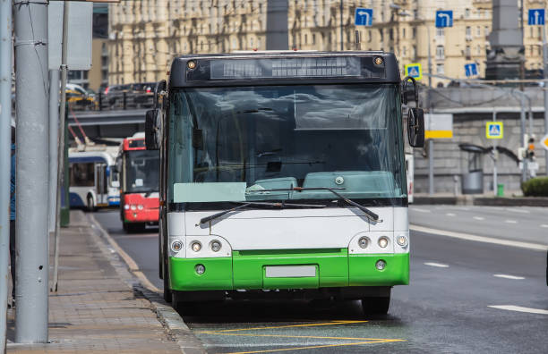 istock city buses move down the street 1192178141