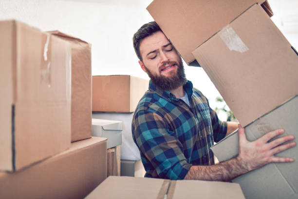 istock Male Storing Received Packages In Office 1192183084