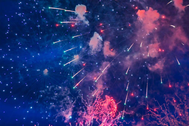 istock Inexpensive fireworks over the city sky 1192183118
