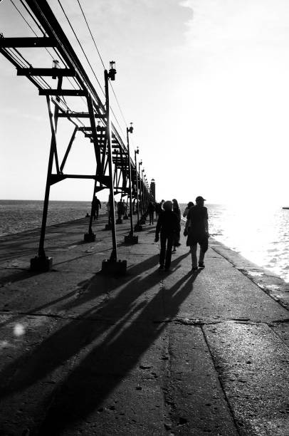 istock Grand Haven Michigan Pier high contrast 1192183672