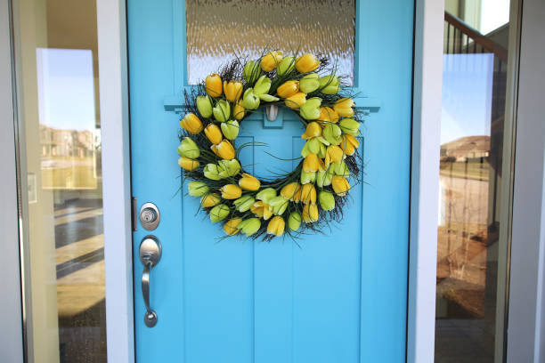 istock Blue Door with Tulip Wreath 1192185501