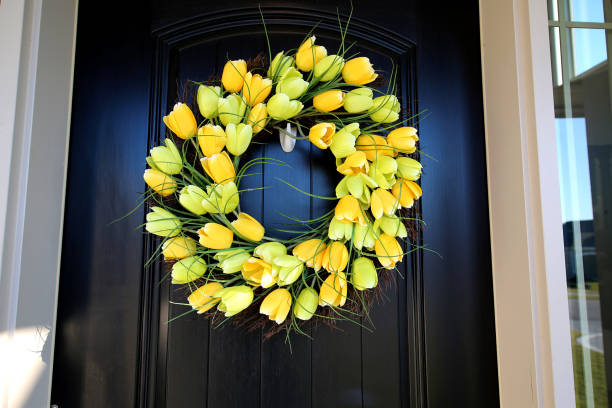 istock Black Door with Tulip Wreath 1192185554