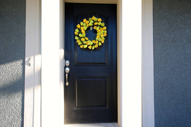 istock Black Door with Tulip Wreath 1192185603
