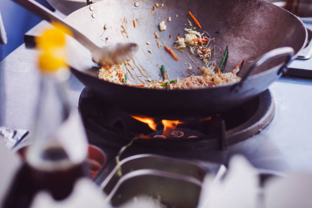 istock fried noodles in a wok 1192189325