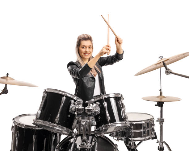 istock Beautiful female drummer with a drumkit and drumsticks 1192194098