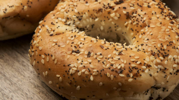 istock Organic Everything bagels from above over a wooden table 1192198030