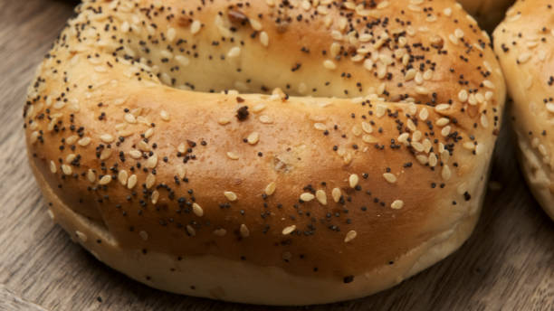 istock Organic Everything bagels from above over a wooden table 1192198038