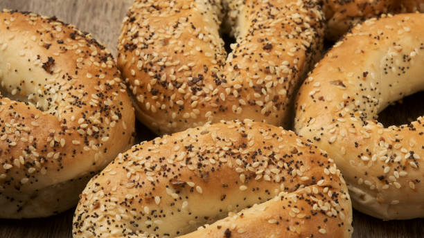 istock Organic Everything bagels from above over a wooden table 1192198051