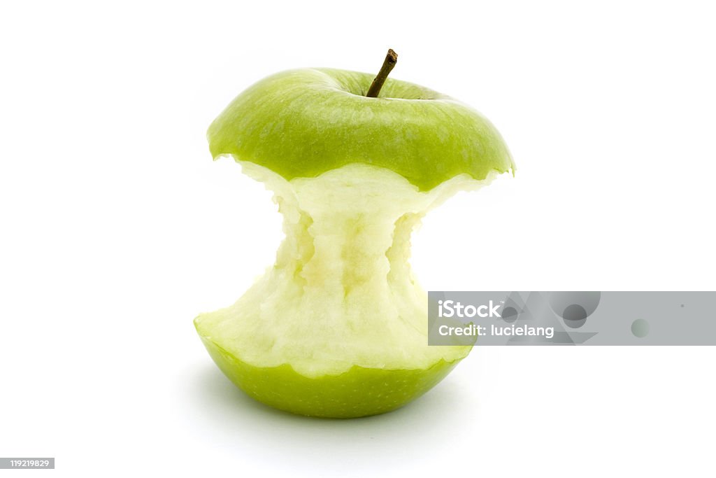 green apple core over white  Apple Core Stock Photo