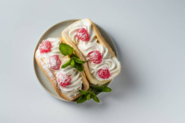 istock Cake with raspberries and sprinkles on a white background 1192200148
